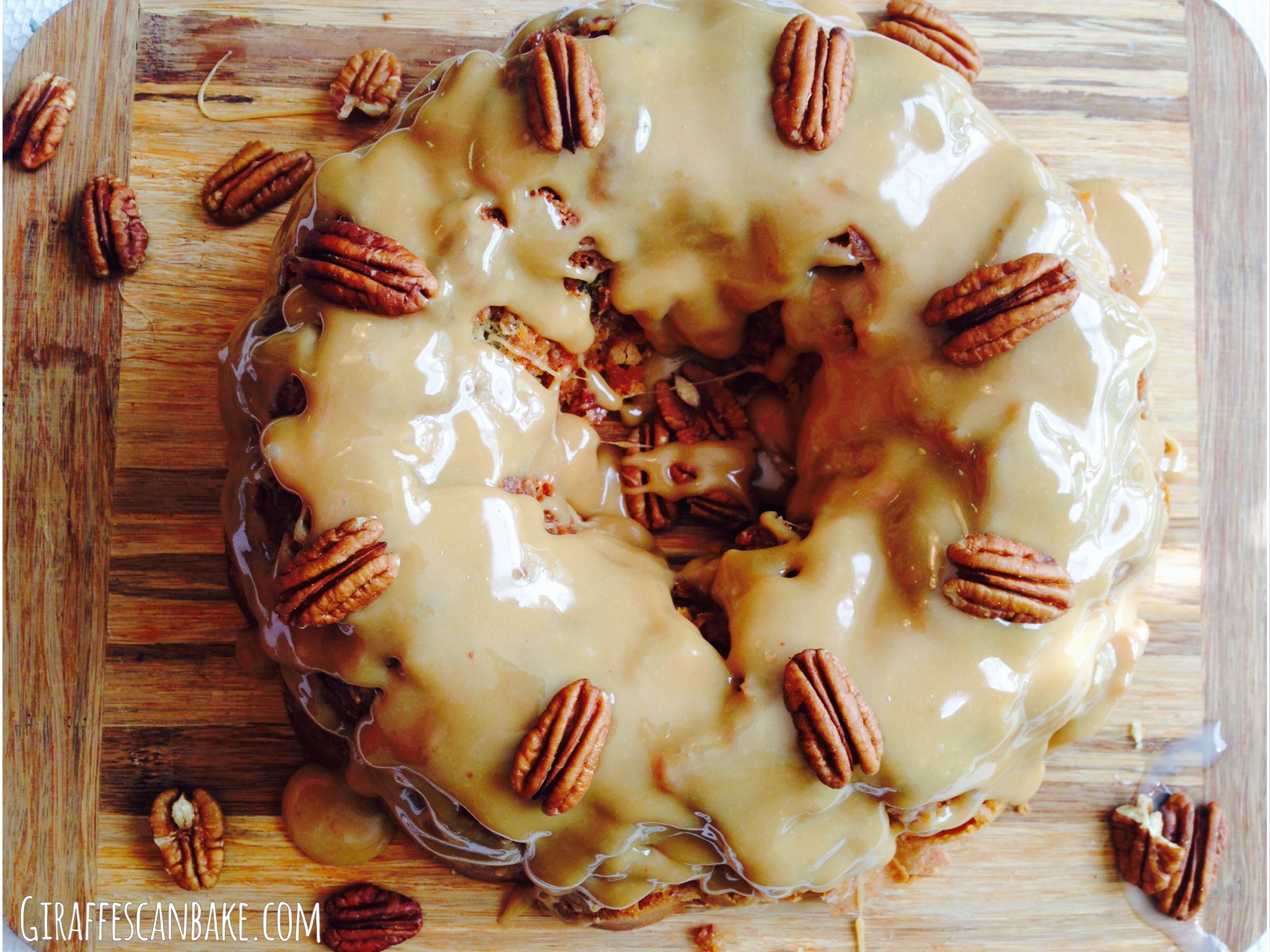 Brown Sugar and Pecan Caramel Bundt Cake - a moist and tender bundt cake stuffed full of pecans and toffee, smothered with thick caramel and topped with pecans!