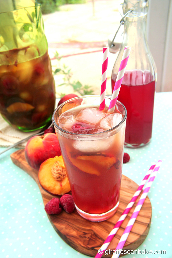 Peach Raspberry Iced Tea by Giraffes Can Bake - refreshing iced tea made with green tea and sweetened with homemade peach and raspberry syrup, the perfect summer drink