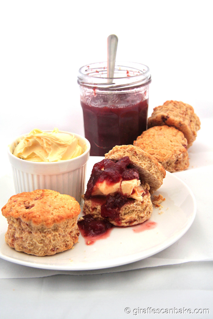 Roasted Strawberry British Scones by Giraffes Can Bake - Buttery, crumbly scones with roasted strawberries baked right in. So easy and quick to make, you can't go wrong. Serve with jam, clotted cream and a cup of tea for your very own homemade Devonshire or Cornish Cream Tea