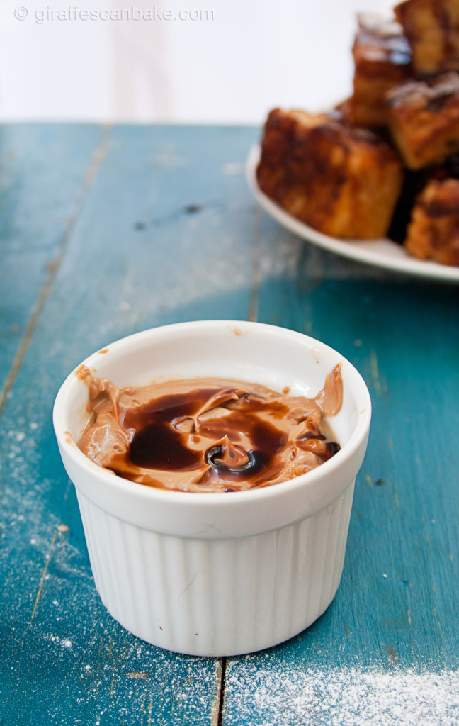 Peanut Butter & Jelly French Toast Bites with Balsamic Dipping Sauce - Delicious brioche french toast stuffed with peanut butter and strawberry jam, in bite size pieces! Plus an amazing balsamic dip to really take this awesome breakfast to the next level! It's an easy, yet impressive breakfast that everybody will love!