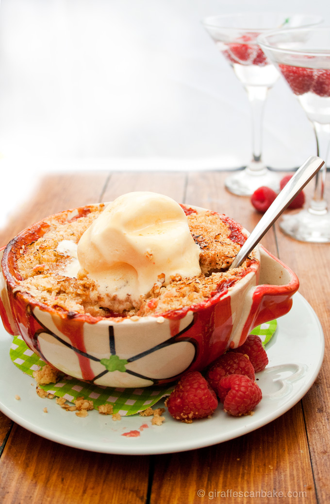 Apple, Raspberry and Ginger Crumble for two - a sweet and tart fruit filling with a warming kick of ginger, topped with a buttery, crunchy crumble topping. The perfect size for two to share this Valentine's Day!
